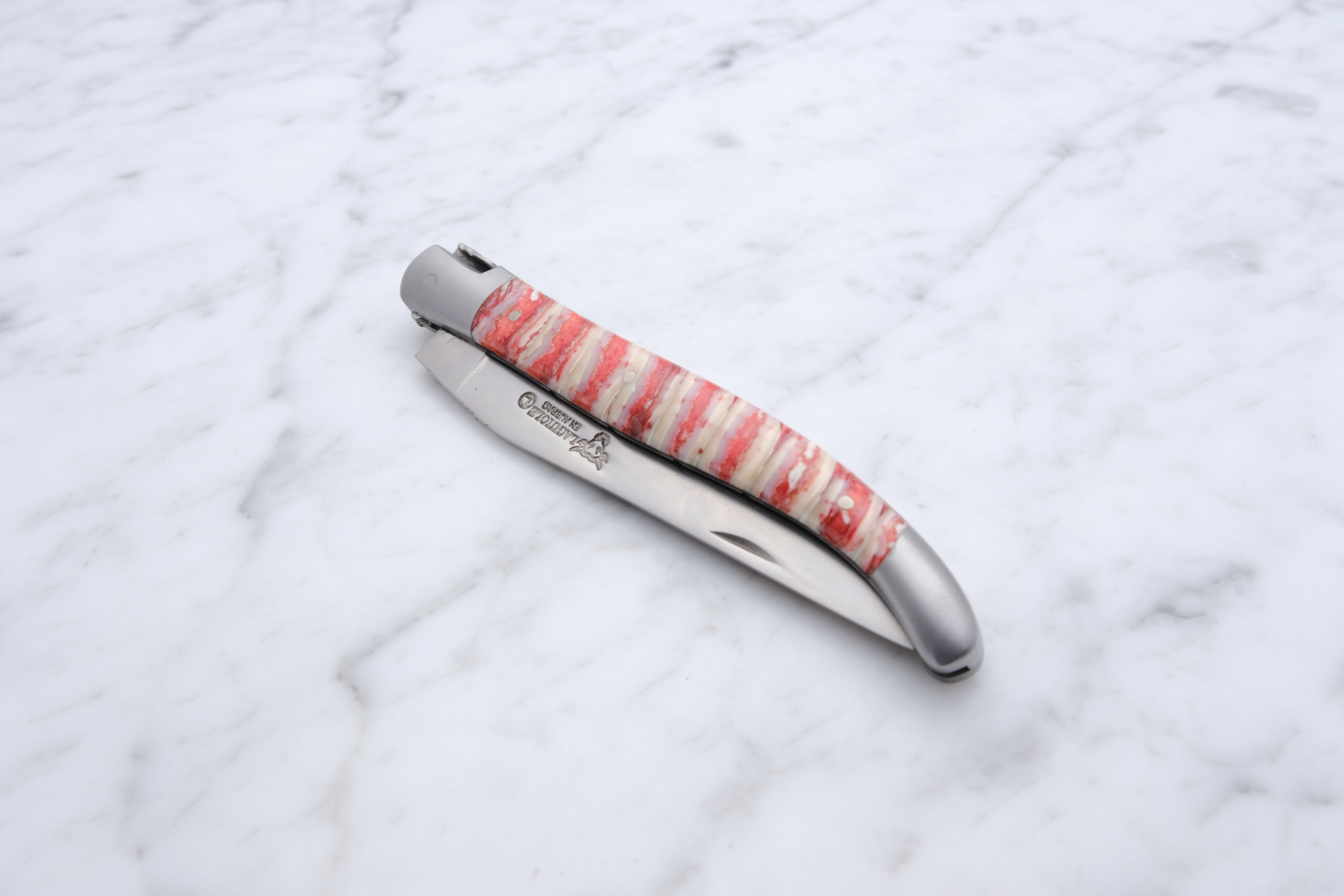 Laguiole Folding knife 12cm. - Stabilized Mammoth molar Red