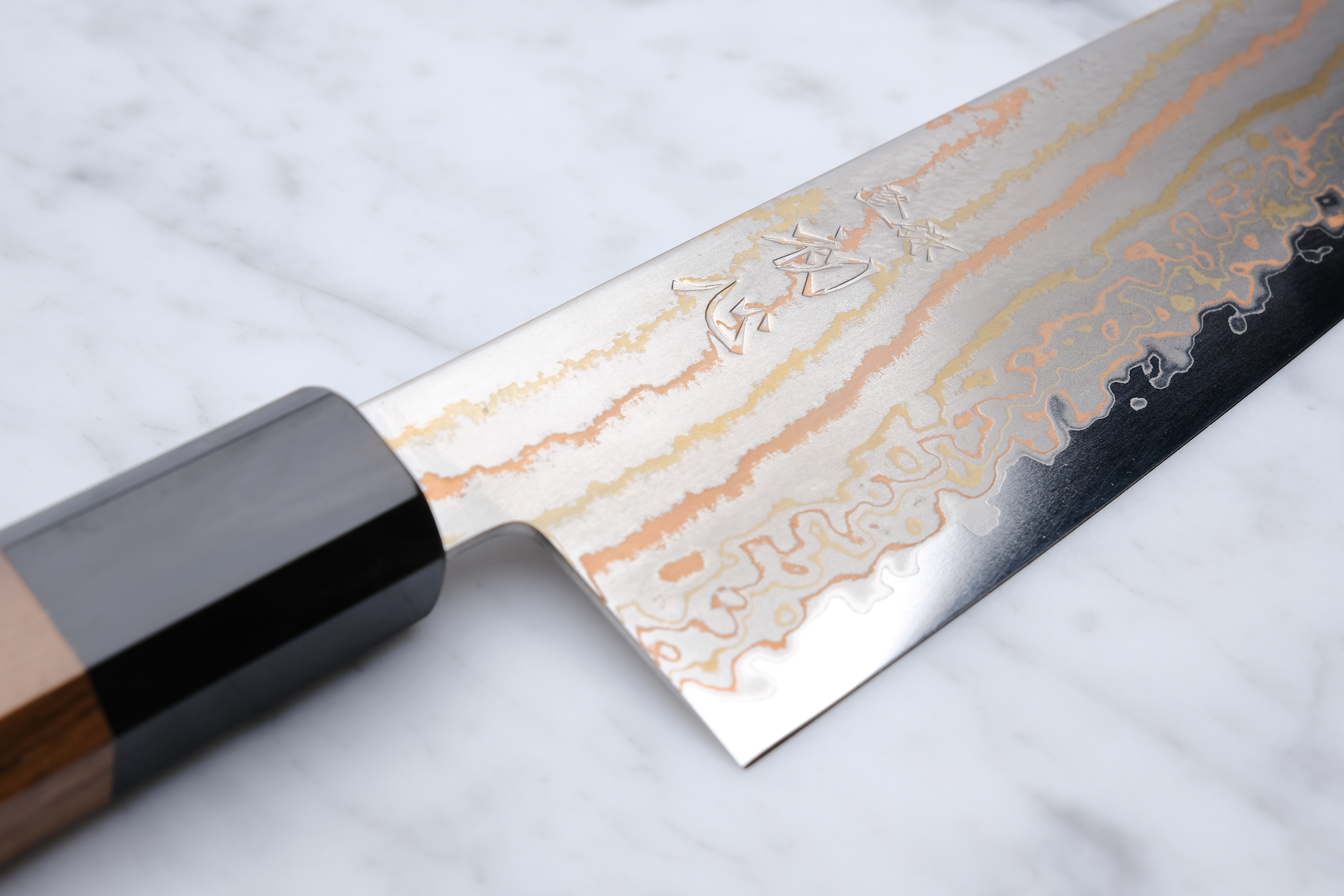 Hatsukokoro Hayabusa Rainbow Damascus 180mm. Santoku