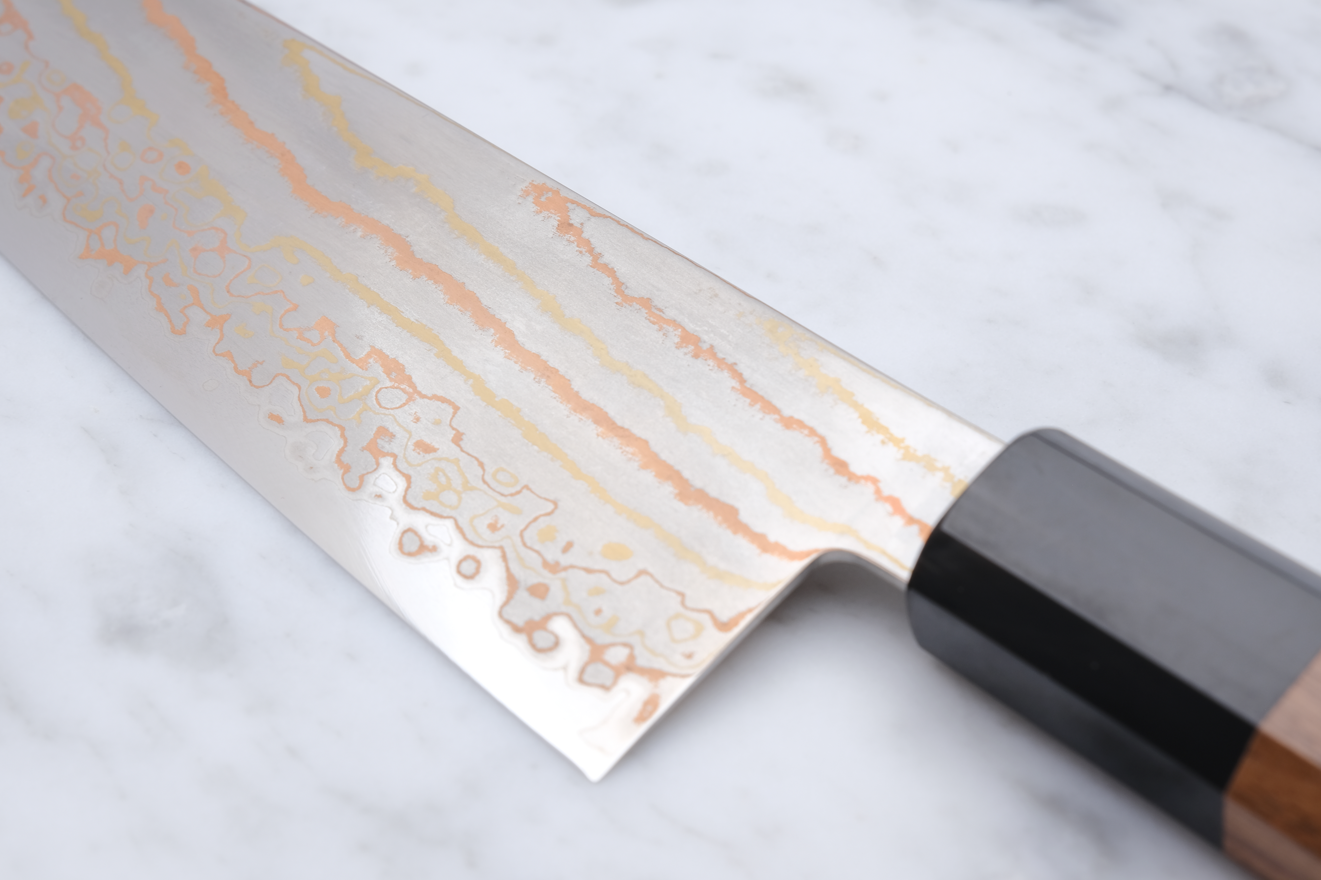 Hatsukokoro Hayabusa Rainbow Damascus 180mm. Santoku